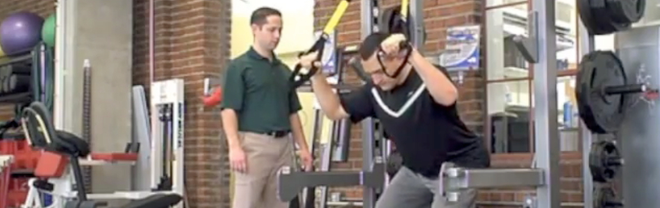 Reinold trx squat